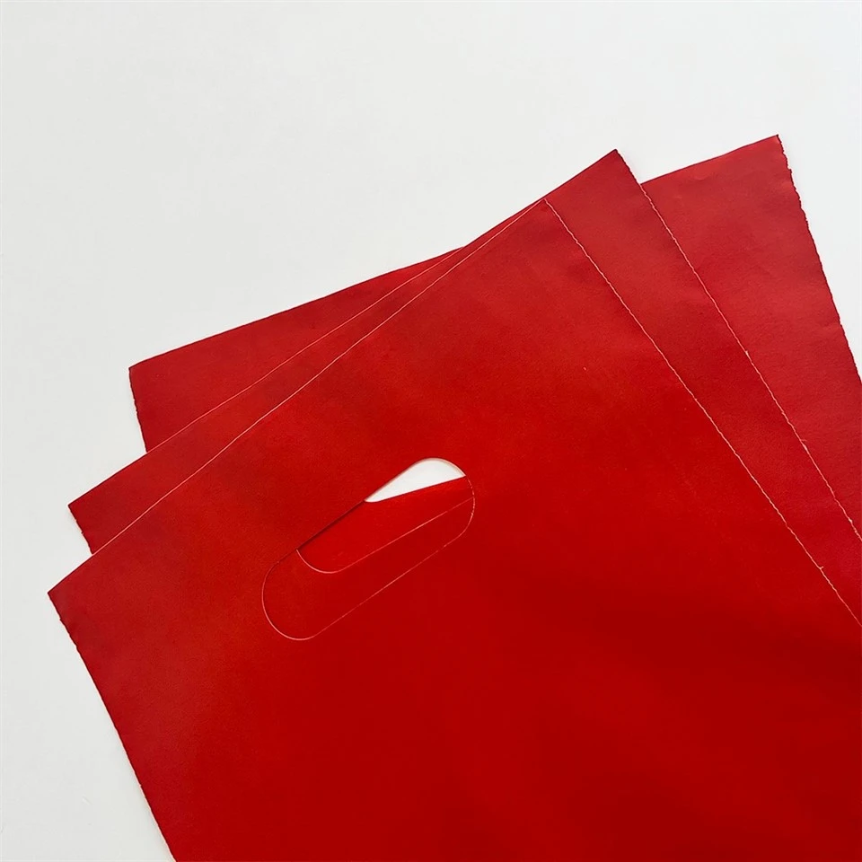 punched handle carrier bags